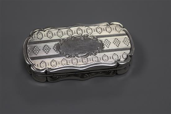 A Victorian engraved rounded rectangular silver vinaigrette, Robert Thornton, Birmingham, 1870, 50mm.